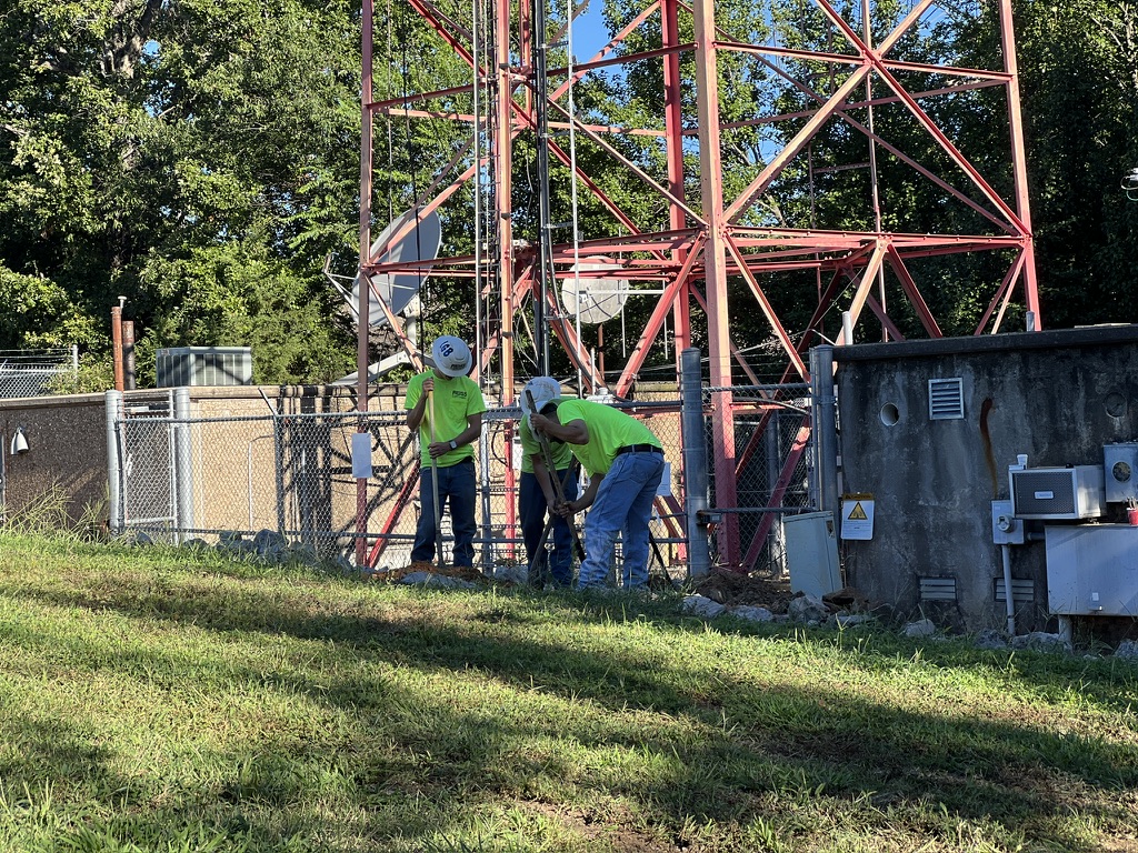 Telecom contractor working on job site